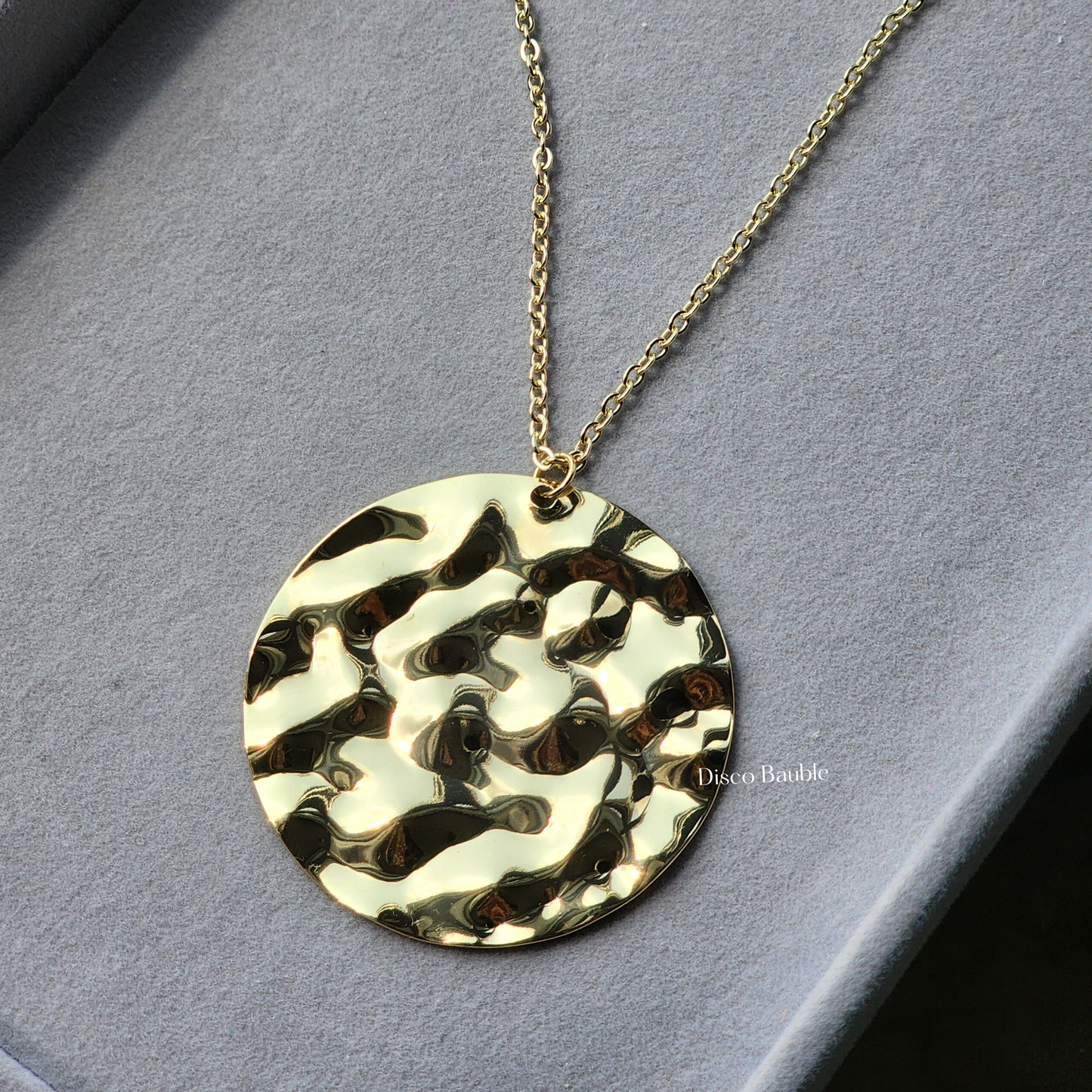 Crushed gold pendant with chain